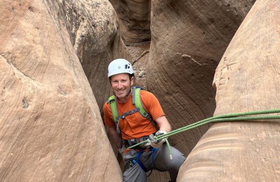 Rappelling in Entrajo Canyon on a guided canyoneering tour in Moab, UT
